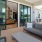 Covered outside patio with ample seating overlooking the pool.