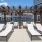 Lounge chairs situated on the pool deck