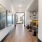 Spacious leasing office with modern style artwork on the wall.