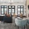 Spacious well lit clubhouse with a firepit and tv and plenty of seating. 